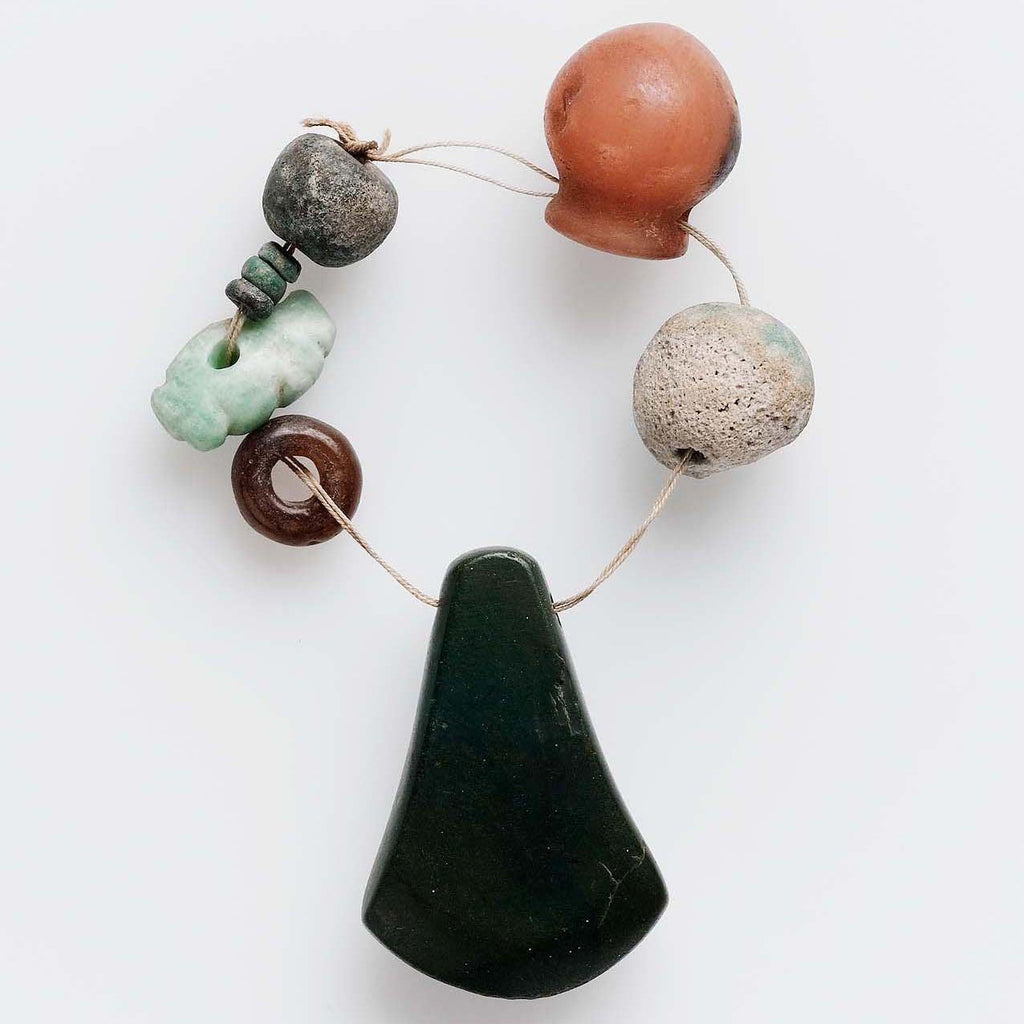 String of nine beads of various stones and shapes with an amulet from ancient Egypt in the Museum of Fine Arts Boston
