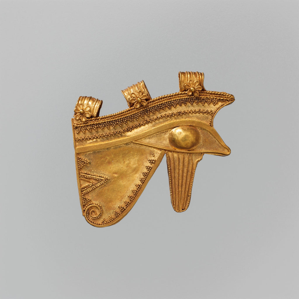 A gold pendant in the form of the Eye of Horus with granulation and wire decoration from ancient Egypt in the Met Museum