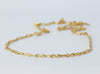 Ancilia Chain by Alexis Menten with 20k gold figure-of-eight shaped links handmade in an ancient style shown close up
