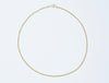 Apeiron Chain by Alexis Menten with intricate 22k gold links handmade in an ancient style shown from the front
