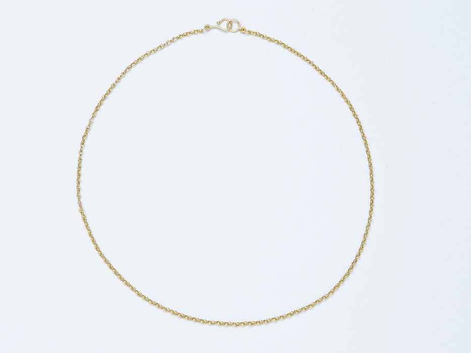 Apeiron Chain by Alexis Menten with intricate 22k gold links handmade in an ancient style shown from the front
