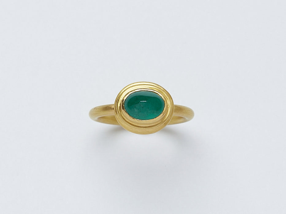 Hellenistic Ring by Alexis Menten handmade in an ancient style with 22k gold and an emerald shown from the front