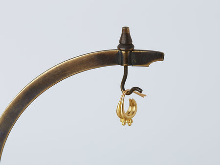 Mari Earrings handmade by Alexis Menten with 22k gold ancient style crescent hoops and cluster of granules on a metal hook