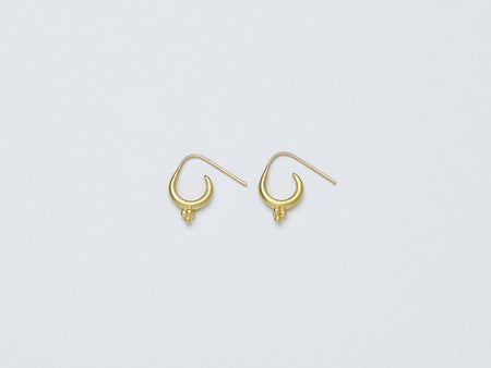 Mari Earrings handmade by Alexis Menten with 22k gold ancient style crescent hoops and granules shown from the side