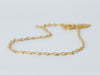 Nuru Chain by Alexis Menten with 20k gold twisted figure-of-eight links handmade in an ancient style shown close up