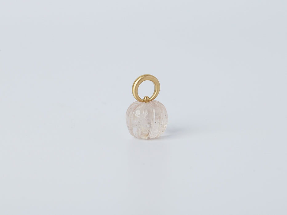 Omphalos Necklace by Alexis Menten with an ancient style morganite melon bead pendant and 20k tapered bail shown close up