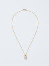Omphalos Necklace by Alexis Menten with an ancient style morganite melon bead and 18k chain shown from the front
