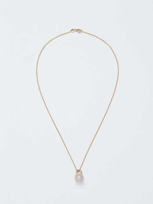 Omphalos Necklace by Alexis Menten with an ancient style morganite melon bead and 18k chain shown from the front