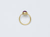 Satnal Ring by Alexis Menten handmade in an ancient style with 22k gold, a ruby, and two granules shown from the side