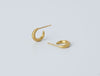 Selene Earrings by Alexis Menten with 22k gold crescent hoops handmade in an ancient style shown from the front and the side