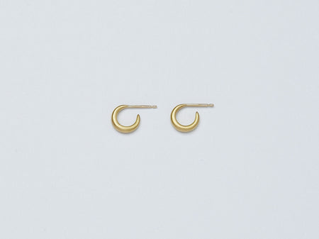 Selene Earrings by Alexis Menten with 22k gold crescent hoops handmade in an ancient style shown from the side