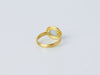Thyra Ring by Alexis Menten handmade in an ancient style with 22k gold and aquamarine showing the open back setting